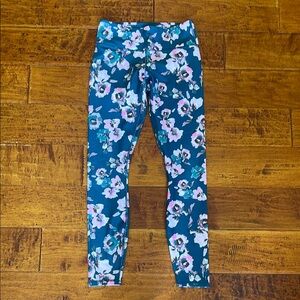 Fabletics XS green leggings with colors of pink floral print.